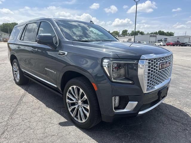 2021 GMC Yukon Denali in Dark Sky Metallic — front three-quarter view