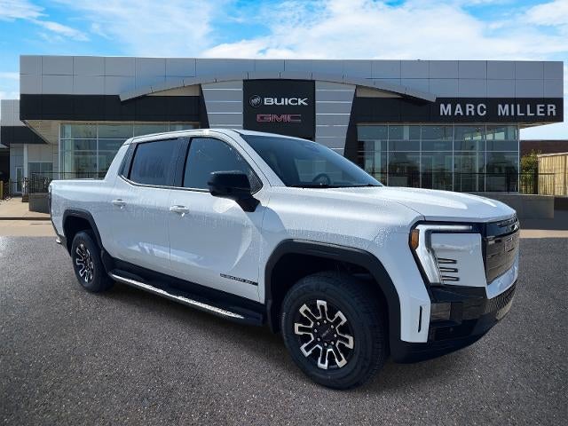 2026 GMC Sierra EV Elevation Standard Range in Summit White — front three-quarter view
