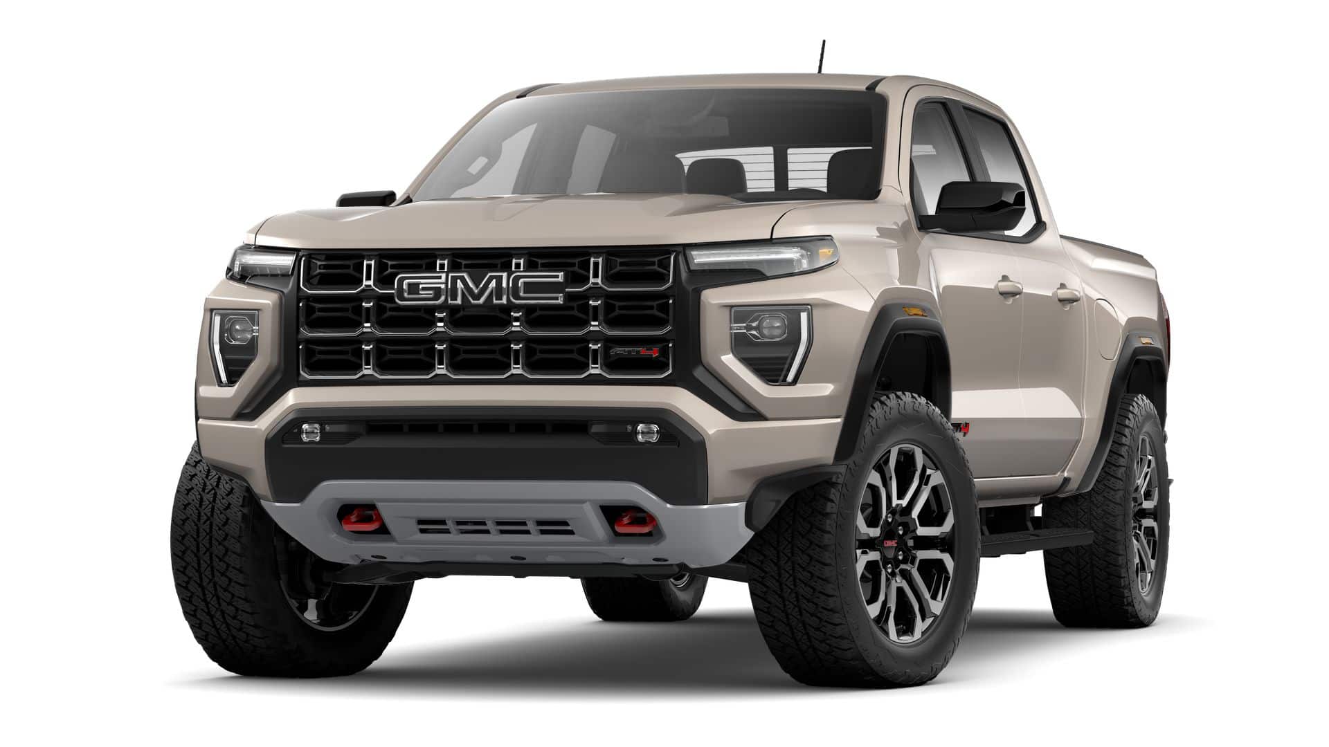 2026 GMC Canyon AT4 in Coastal Dune — front three-quarter view