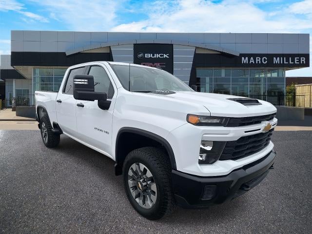 2025 Chevrolet Silverado 2500 HD Custom in Summit White — front three-quarter view