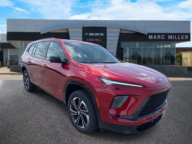2026 Buick Enclave Sport Touring in Cherry Red Tintcoat — front three-quarter view