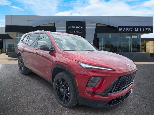 2026 Buick Enclave Sport Touring in Cherry Red Tintcoat — front three-quarter view